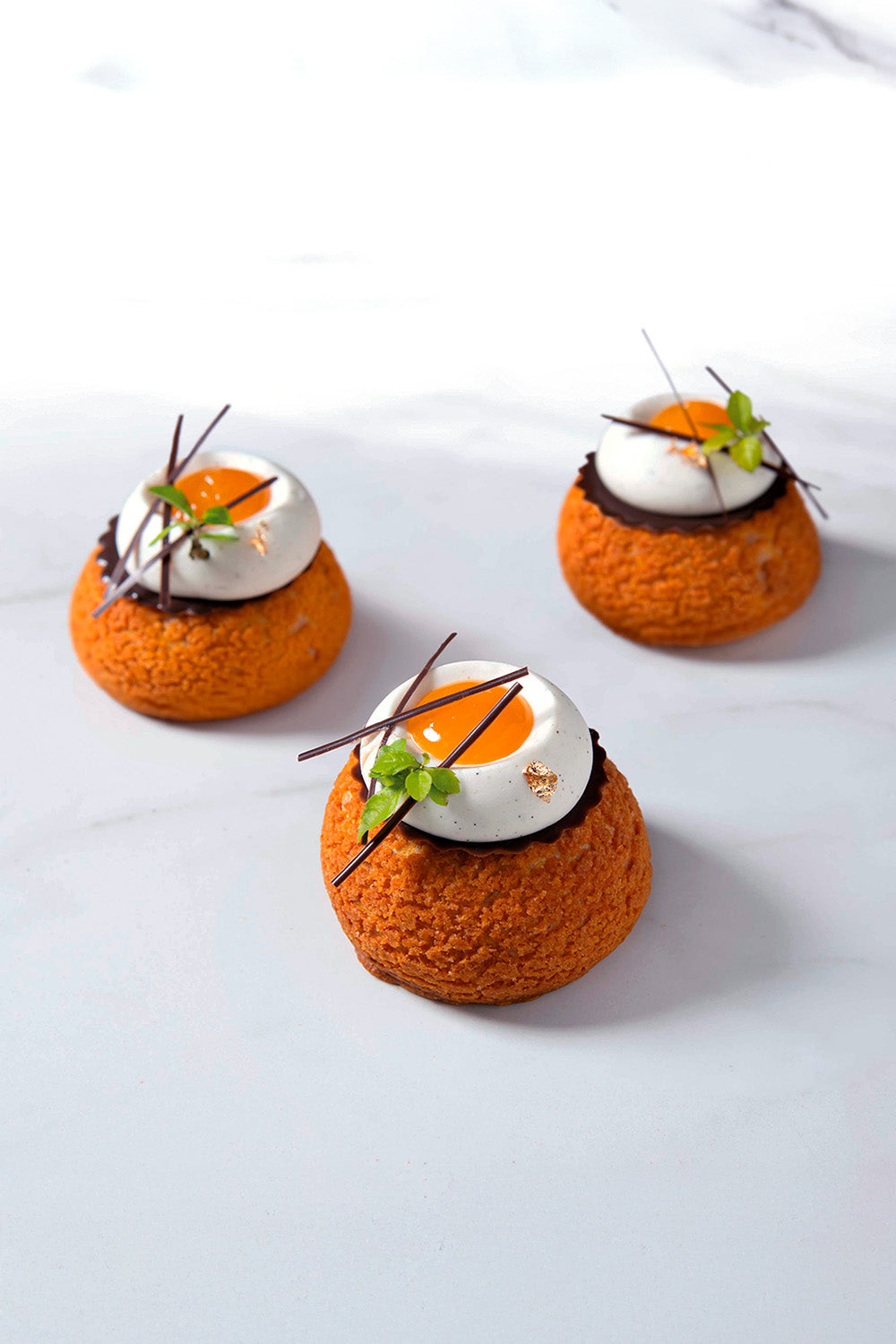 Religieuse de Cúrcuma y  Maracuyá